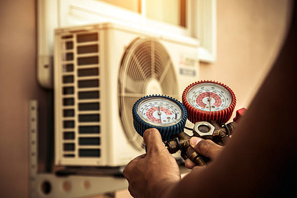 Professional Hvac technician working in Russellville, AR